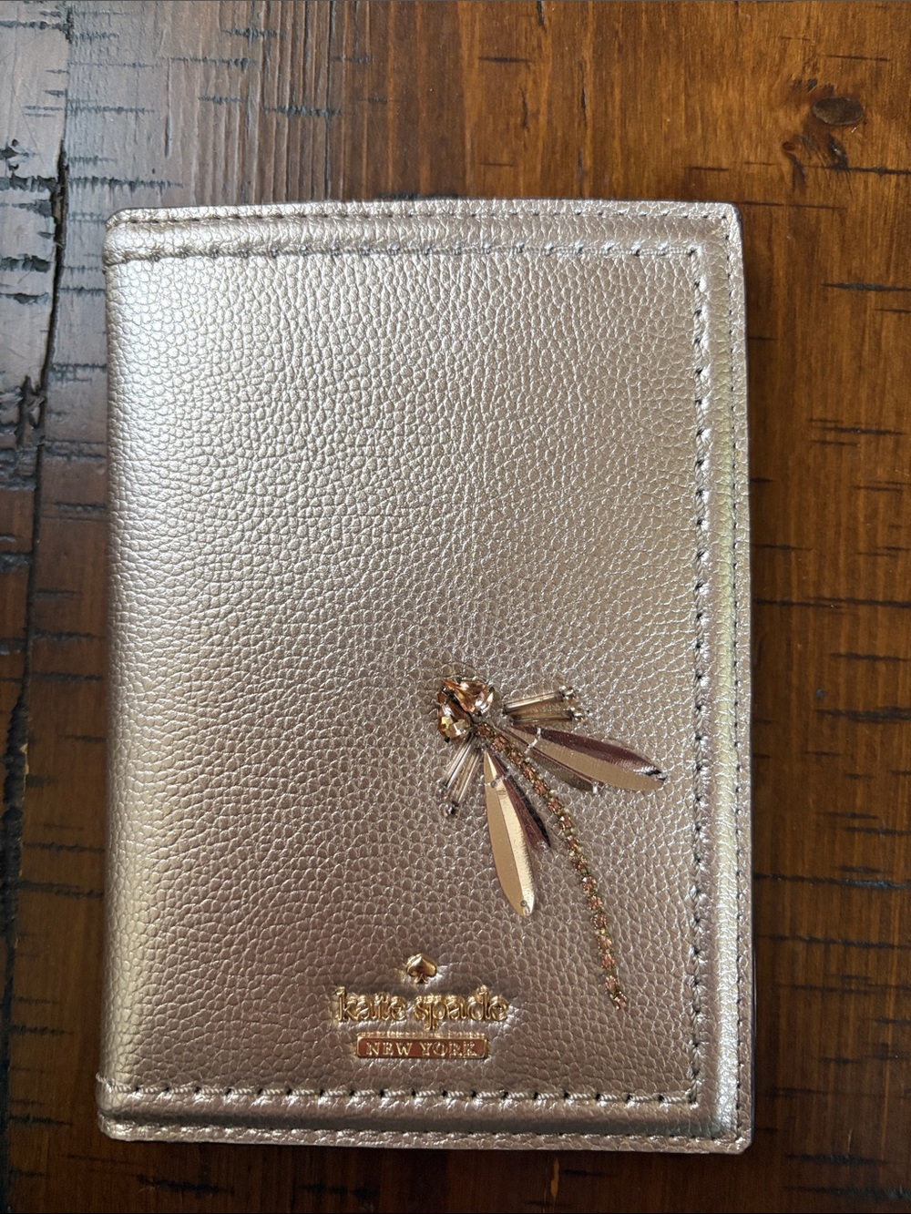 kate spade metallic gold leather passport and cardholder.
